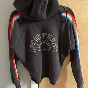 SPIRITUAL GANGSTER RAINBOW SLEEVE HOODIE. Size xs, fits like a small.